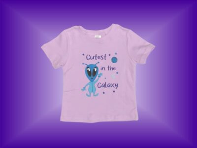 Cutest in the Galaxy Baby Girl Alien T-shirt. Cute Baby Girl Alien Design on Light Purple with Alien and Space Saucer Pattern Leggings. Sizes 18 months to 3T.