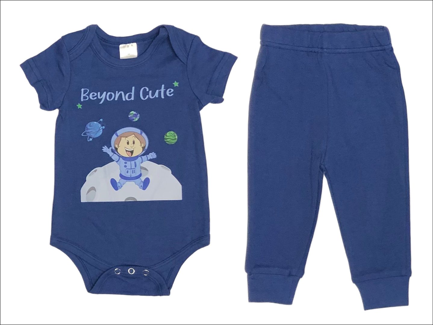 Beyond Cute Astronaut matching 2-Piece Set in Navy for Baby Boys. Beyond Cute Boy Astronaut on a Navy top with matching Navy Sweatpants. 100% cotton. 2-Piece Set Options: Onesie and Sweatpants Set sizes 3 to 18 months T-shirt and Sweatpants Set Sizes 18 to 36 months